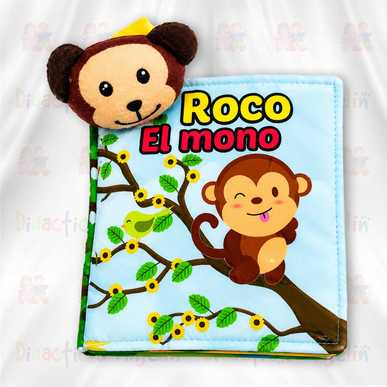 Libro didáctico de tela para bebés con divertido personaje de mono y colores llamativos, ideal para estimulación visual temprana, aprendizaje y desarrollo sensorial infantil.