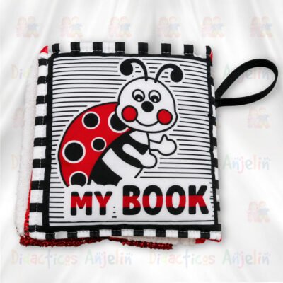 Libro sensorial de tela para bebés con ilustraciones de alto contraste en colores negro, blanco y rojo, ideal para estimulación visual temprana y desarrollo cognitivo infanti